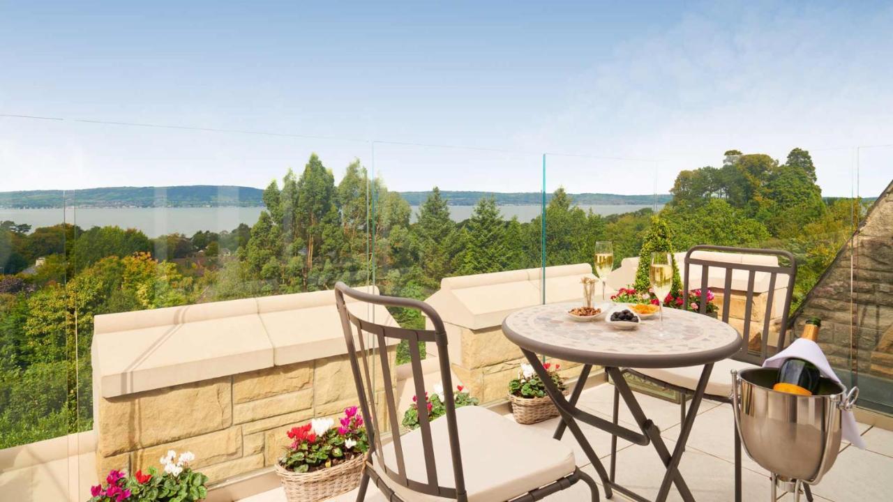 The Culloden Estate And Spa Holywood  Εξωτερικό φωτογραφία A view of the lake from the balcony of a house in the village